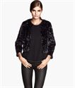 Image de H&M Veste en fausse fourrure